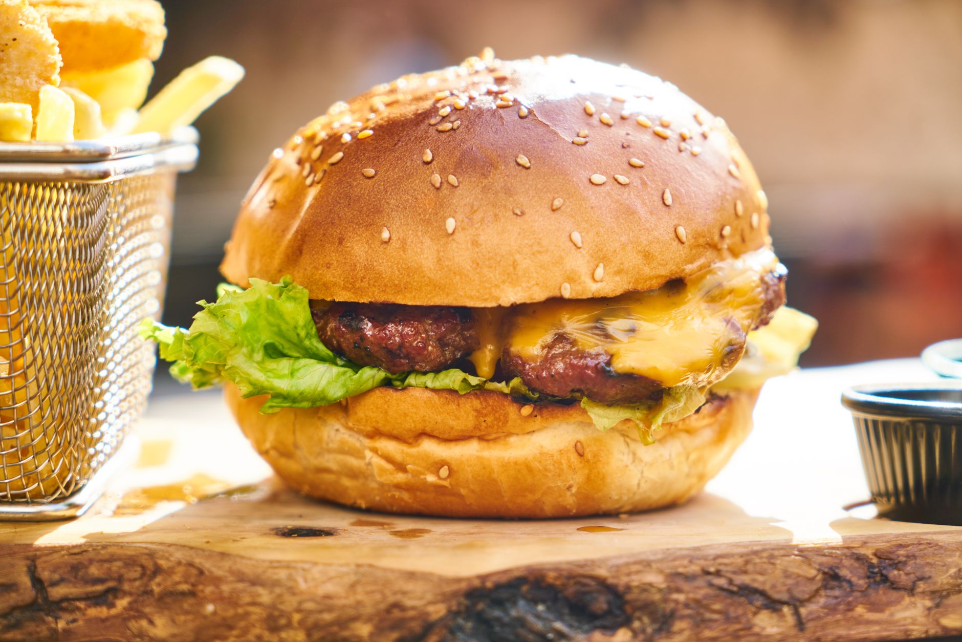 Air fryer turkey burger for one served on a bun with lettuce and cheese.