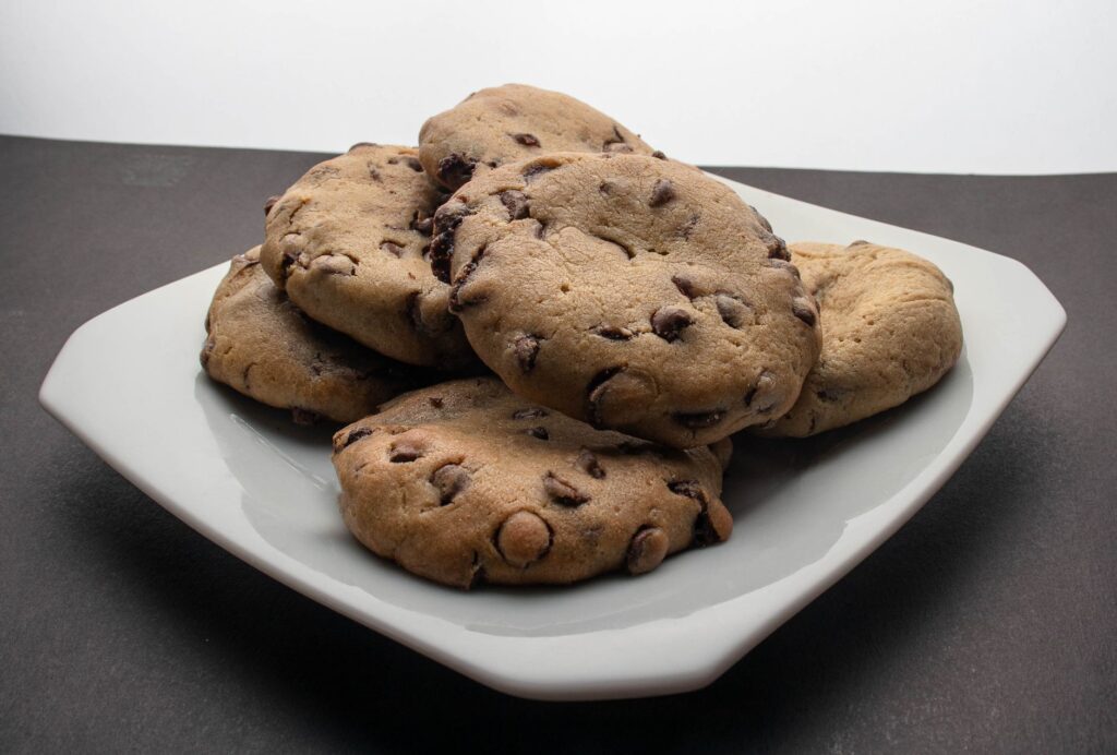 Small batch air fryer cookies stacked on a white plate.