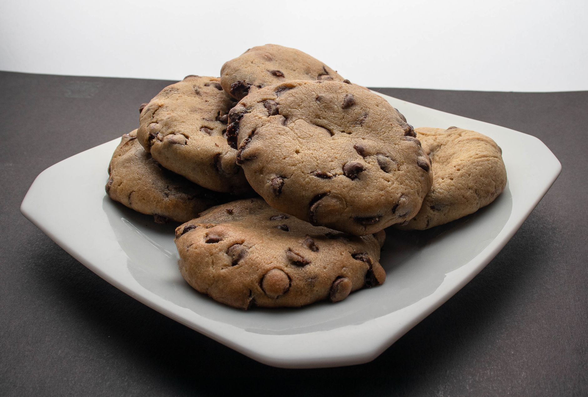 Small batch air fryer cookies stacked on a white plate.